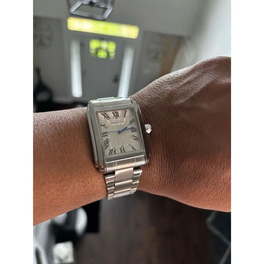 Invicta Silver Watch with Blue Hands and Roman Numerals